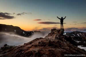 Hiking photography in Iceland - hiker on a mountain in Landmannalaugar